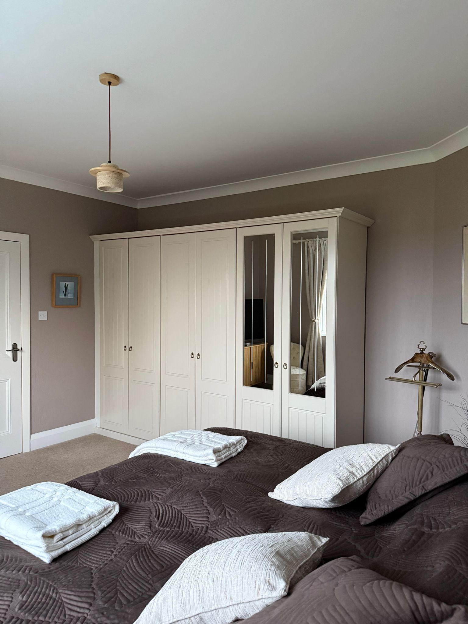 Brand-new bedroom interior in calming tones.